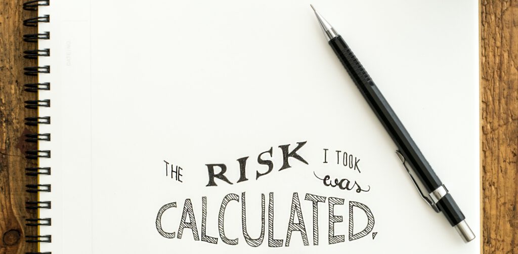 the risk I took was calculated op schrift gedrukt met pen ernaast